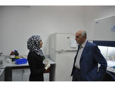 Shahnaz Mahajna at the lab, with Mr.Moneeb Al Masry